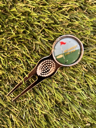 Nearest the pin metal golf - the,