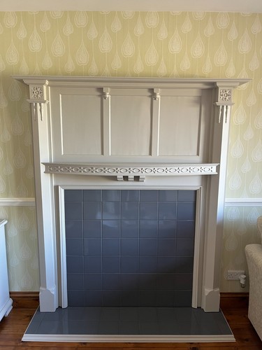 Wooden fire surround and - fire,