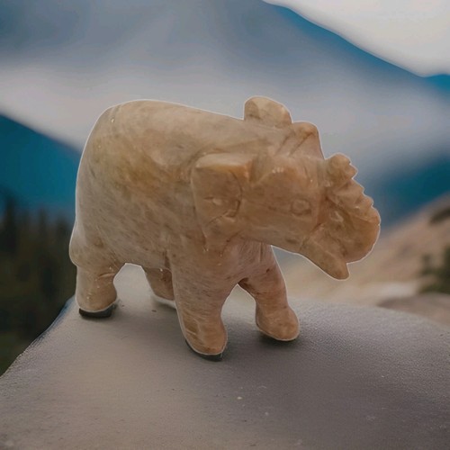 Hand carved stone elephant 6cm - hand,