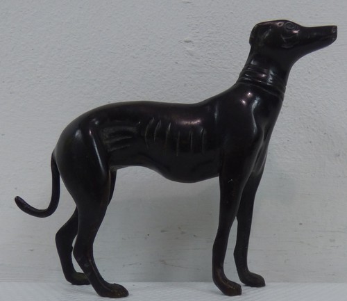 Heavy cast metal - heavy, dog