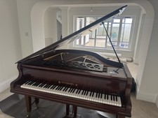 Schimmel Baby Gand Piano. It