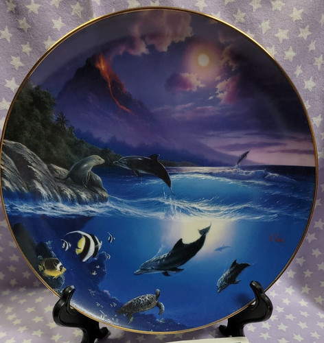 Dolphin kiss seal of - kiss,