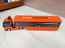 1/43  Orange Arrows F1 Volvo Transporter. Missing one mirror. 