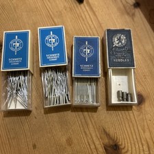 4 Schmitz Needle Boxes Contain