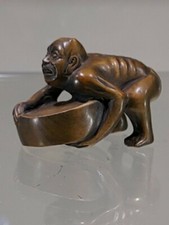 OLD JAPANESE BOXWOOD NETSUKE  - MAN LIFTING - SIGNED TAMAMATSU