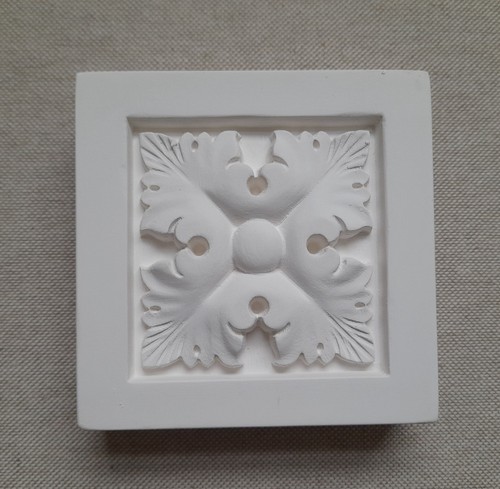 Pair carved design plaster - carved,