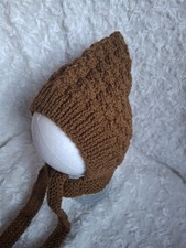 Hand knitted baby pixie bonnet