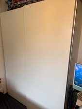 Large white IKEA Pax wardrobe with sliding doors and inserts 