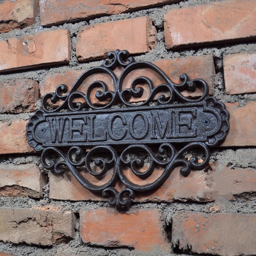 Cast iron welcome sign - iron,