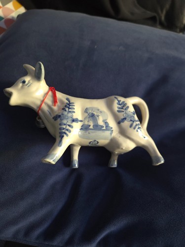Blue white delph pottery cow - &,
