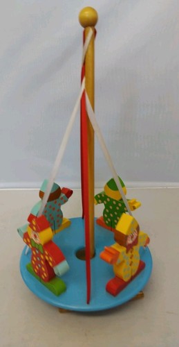 Wooden spinning toy clowns - spinning, by