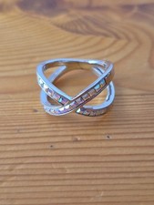 Aurora Silver Tone Cross Over