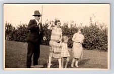 RPPC: Social History. People. Family Throwing At Coconut Shy. Unposted.