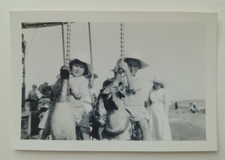 Antique Photograph Of Boy And Girl On Carousel Horse Ride