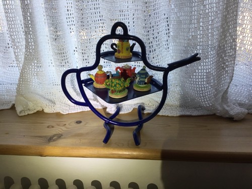 Vintage tetley teapots with - teapots, a