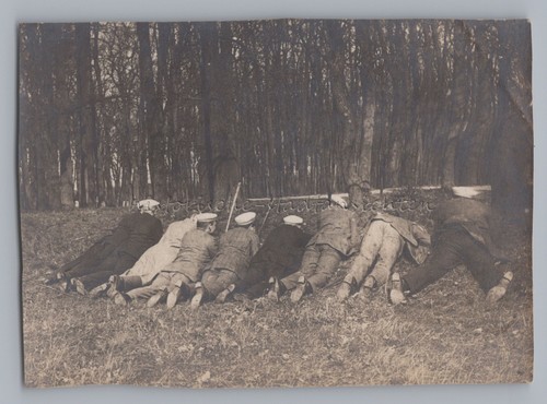 Young men lying hiding - young,