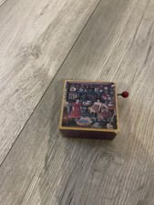 small wooden music box with a