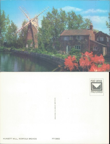 Windmill and house - by, river
