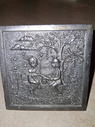 Hand chiseled pewter plate
