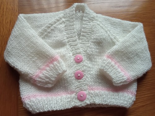 Hand knitted baby girls