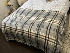 Fringed Wool Throw In Grey, Black And Cream Check.