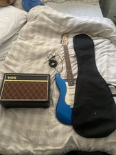 electric guitar Stratocaster glitter dark blue no handle with lead, used