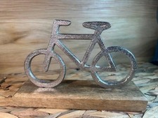Bicycle Ornament on a Wood