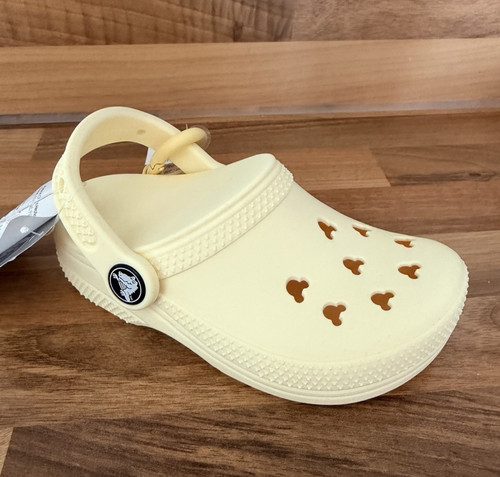 Disney parks yellow crocs - disney,