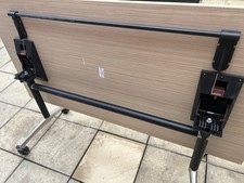 Flip flop  Folding Table Has Easy quick release  pull handle and locking wheels