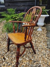 A Fantastic Yew Wood Childs Windsor Chair With Crinoline Stretcher