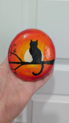 Hand painted pebble cat - hand,