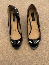 Principles Navy blue and cream