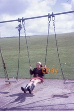 35mm Slide - Girl In Wellington Boots On Playground Swing, 1968