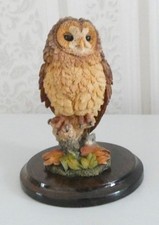 TAWNEY OWL WITH MOUSE BY