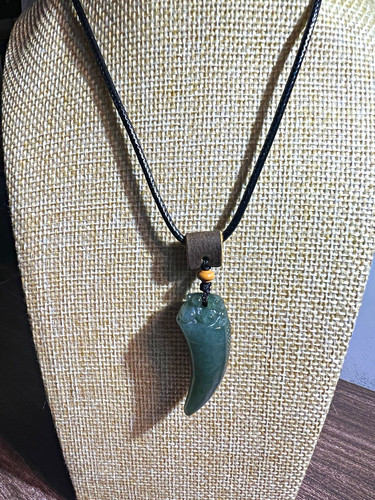 Natural jade wolf tooth