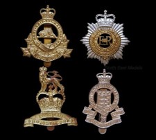 Four Canadian Army Cap Badges