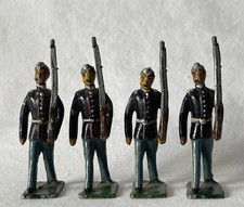 4 Vintage Painted Lead Toy