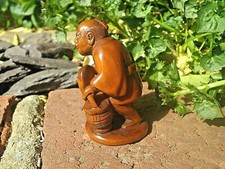 Hand Carved wood netsuke Man