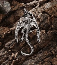 Silver coloured flying dragon - flying,