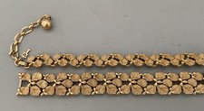 GOLD TONE TRIFARI BRACELET &