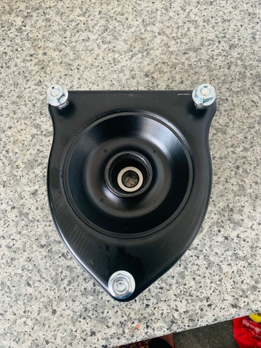 Front strut top - front,