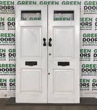 HARDWOOD DOUBLE FRONT DOORS