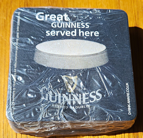 Guinness cardboard beer mat - cardboard,