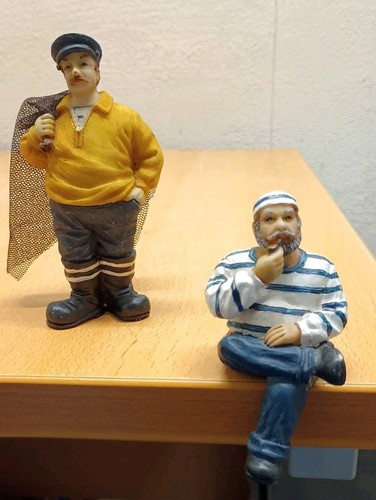 Vintage resin fisherman - x,