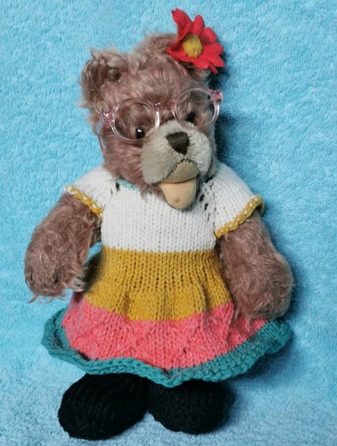 Hand knitted teddy bear