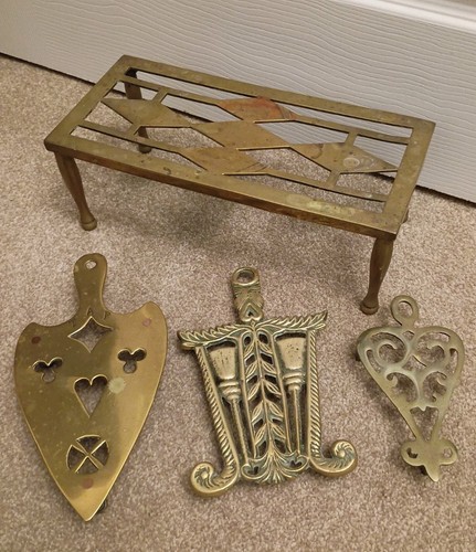 Antique brass trivets - ,
