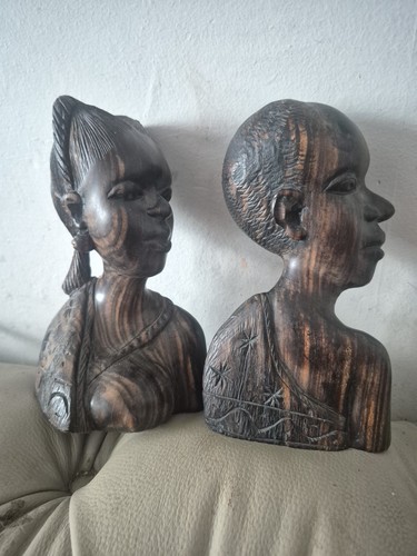 Pair head sculptures - of,