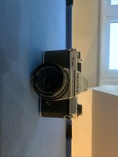 Asahi Pentax K1000 with 1.7 Pentax SMC – M 50 mm Lens with leather case