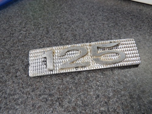 Suzuki oem frame cover emblem - suzuki,