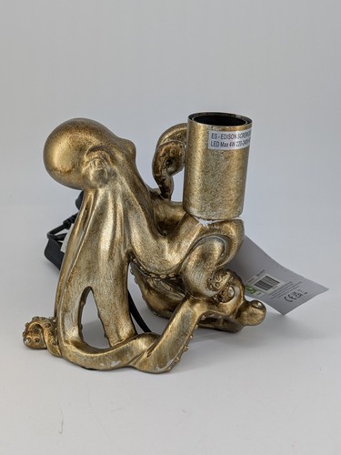 Gold novelty octopus - octopus, table